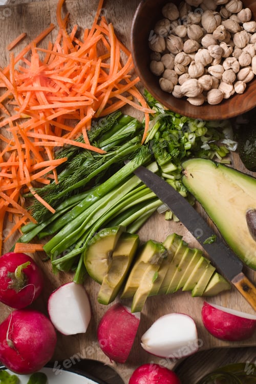 Preview: Sliced vegetables for salad on the table top view