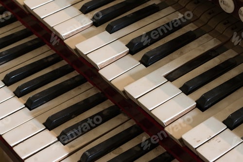 Preview: Detail of old, broken and dusty organ keys