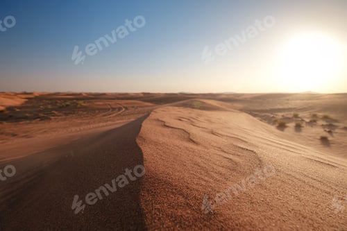 Preview: Sunset over the sand dunes in the desert.