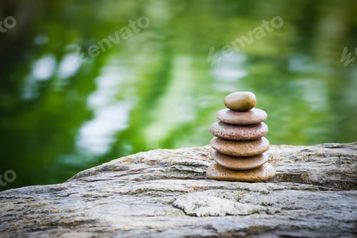 Preview: Stack of zen rocks in garden