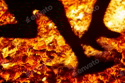 Preview: Summer solstice celebration jumping into the fire. Burning flames