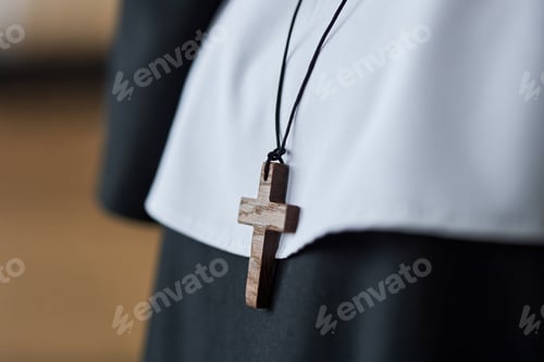 Preview: Wearing Wooden Cross Necklace Over White Garment