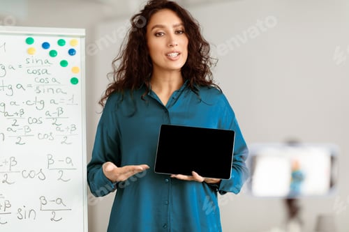 Preview: Lady teacher explaining math online showing tablet to students