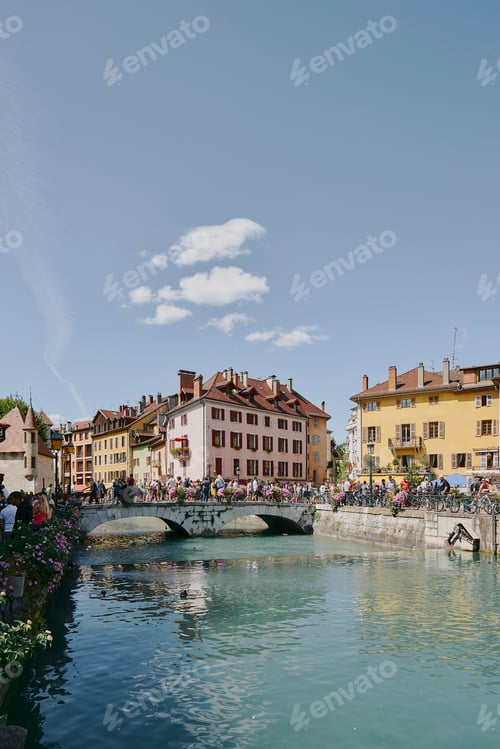 Preview: A bustling day by the river in a picturesque town