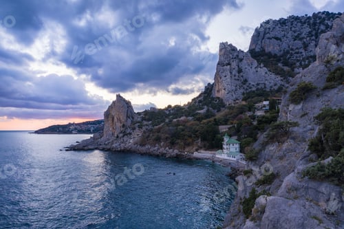 Preview: Aerial view of Simeiz village, Cat mountain in evening sunset light, Crimea. Black Sea