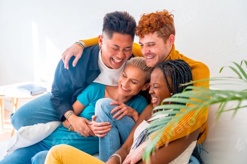 Preview: Diverse group of LGBT friends enjoying a relaxed morning in a comfortable living room