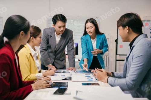 Preview: Businesspeople are discussing company performance and making strategic decisions based on financial