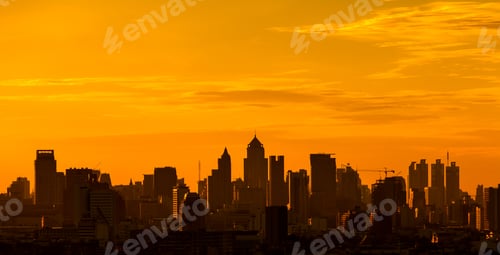 Preview: Hight modern building in city with sunset sky.