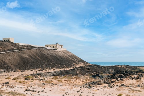 Preview: Lighthouse Building on hill at seaside