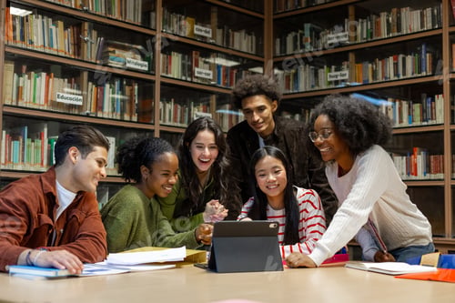 Preview: Diverse students collaborating on tablet in library