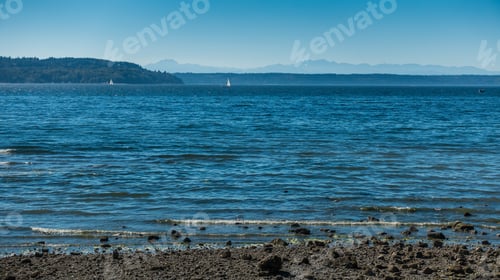 Preview: A View Of The Puget Sound With The Olympic Mountains In The Distance.