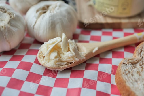 Preview: top view of garlic spread on a spoon