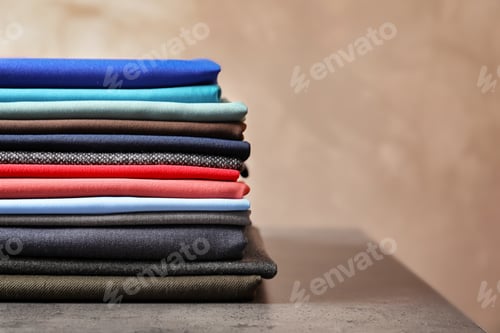 Preview: Stack of Colorful Cloth Materials for Sewing