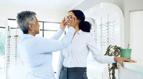 Preview: Optometry, eye care service or happy woman with glasses for vision in a retail optical or eyewear s