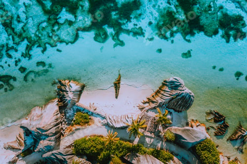 Preview: Aerial photo of coastline shape of beautiful famous paradise tropical beach Anse Source D Argent at