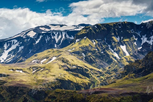 Preview: Rugged mountain with moss and snow covered in rural scene at Icelandic Highlands