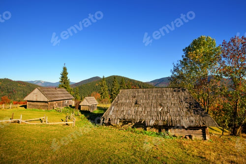 Preview: Beautiful landscape with old wooden huts in the Carpathians moun