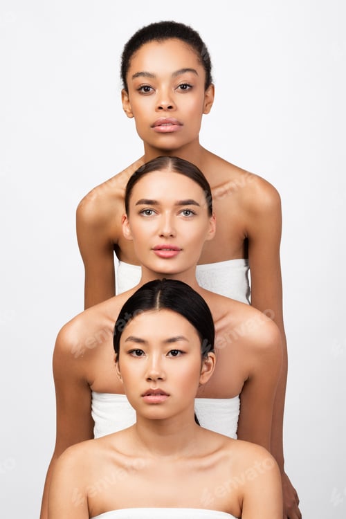 Preview: Three Girls With Different Skin Types Posing Over White Background