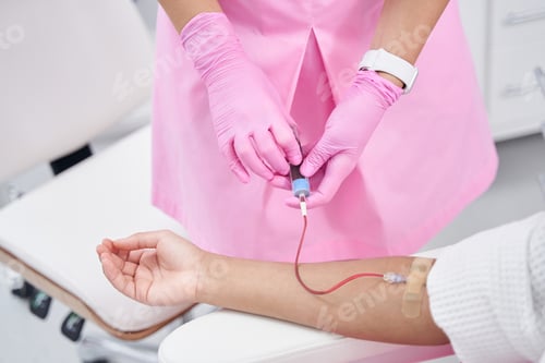 Preview: Platelet-rich plasma given intravenously to a woman in medical cabinet