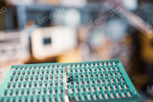 Preview: Close-up side view of a panel of SMD resistors