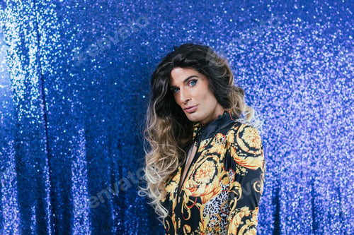 Preview: Confident drag queen against sparkling backdrop
