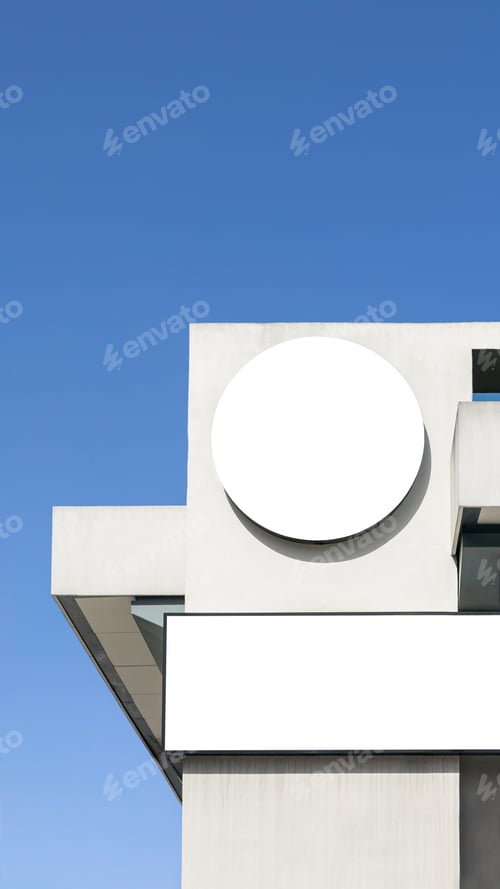 Preview: Blank circle sign mockup in the urban environment, on the facade empty space
