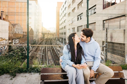 Affectionate Young Couple Sharing A Special Moment Outdoors