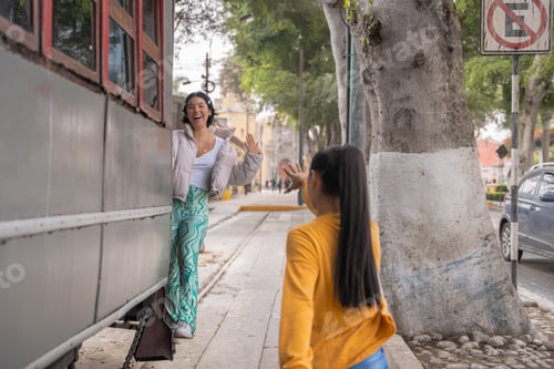 Preview: Friends playing with an ancient wagon in the city