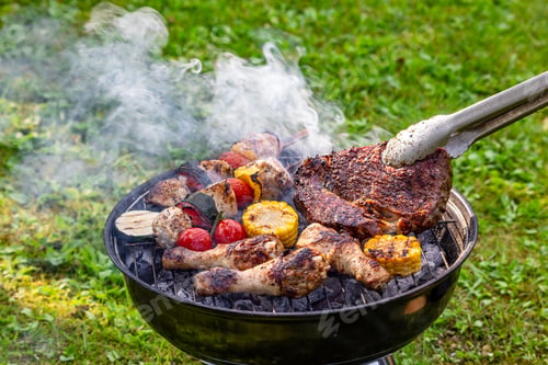 Preview: meat and vegetables on grill