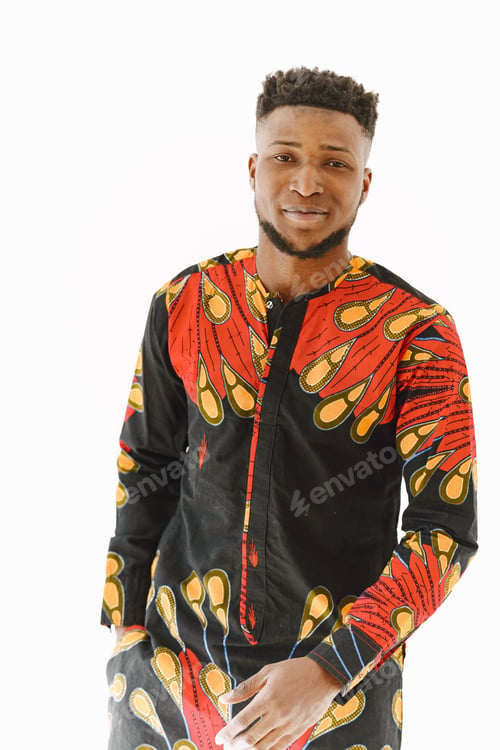 Preview: African young man posing against white wall