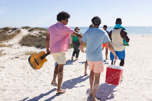 Preview: Diverse group of friends heading to the beach