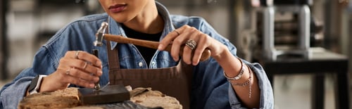 Preview: A skilled artisan carefully crafts exquisite jewelry with precision in a bright workshop