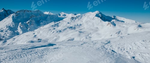 Preview: Drone view of mountain ski slopes.