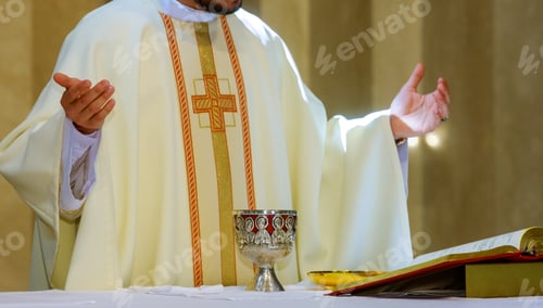 Preview: Holy communion on table in church cup of glass with red wine and bread, prayer for wine