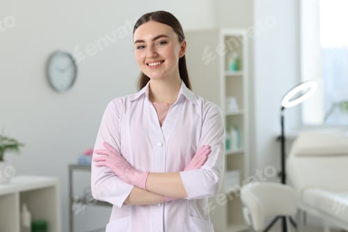 Preview: Cosmetologist in medical uniform in modern clinic
