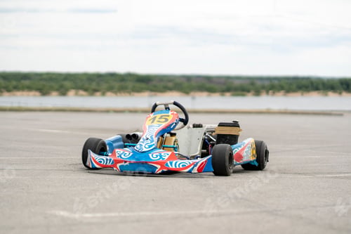 Preview: a karting machine vehicle parked near racetrack, go-kart hobby