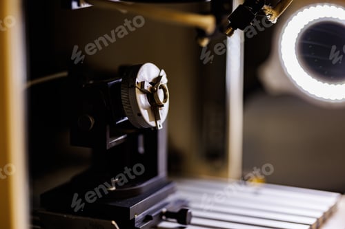 Preview: Close-up shot of a ring engraving machine in a factory