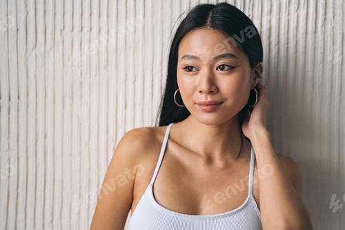 Preview: Portrait of beautiful korean woman, posing as asian model, looking away