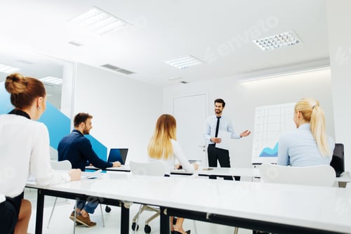 Preview: Businessman lecture to his colleagues at presentation in the conference room