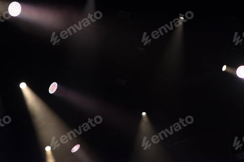 Preview: Stage lights glowing in the dark. Live music festival concept background