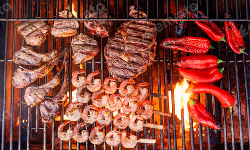 Preview: Juicy steaks and bell peppers sizzling on a grill