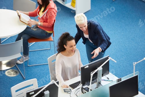 Preview: University students working in library