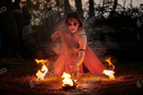Preview: Girl fire dancing performance at outdoor art festival, smooth movements of female artist