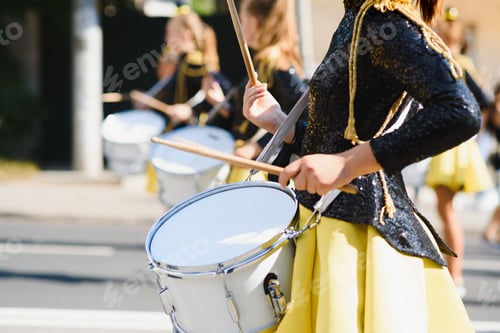 Preview: majorettes with white and blue uniforms perform in the streets of the city. photographic series