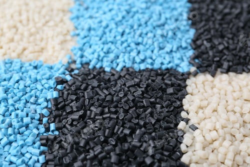 Preview: Pile of colorful plastic granules as background, closeup