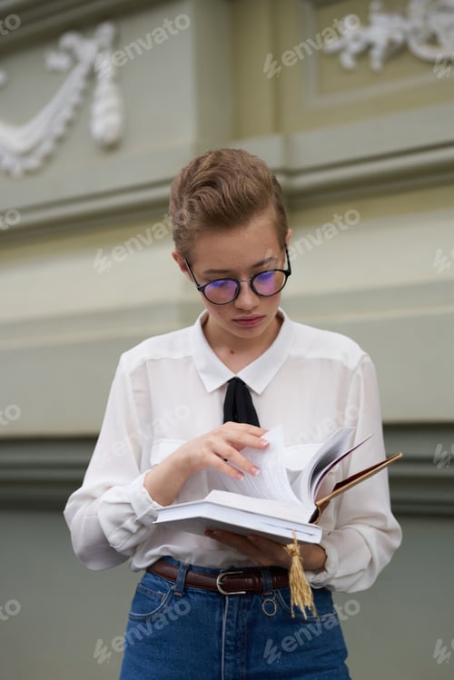 Preview: student on the street near the building rest Lifestyle