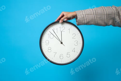 Preview: Hands Showing And Holding Clock