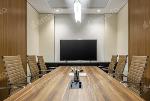 Preview: Shot of an office interior with long table, TV, comfortable chairs, projector, lighting, glass door