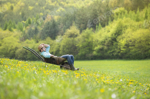 Preview: Farmer with wheelbarrow