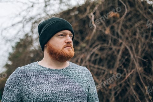 Preview: young man with Redhead beard, and cap